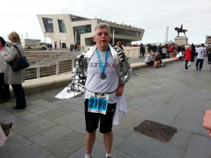 Neil after completing the Liverpool Marathon 2012